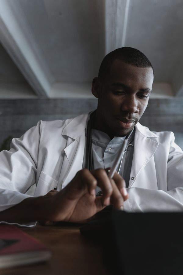 Doctor reviewing clinical information before a consultation