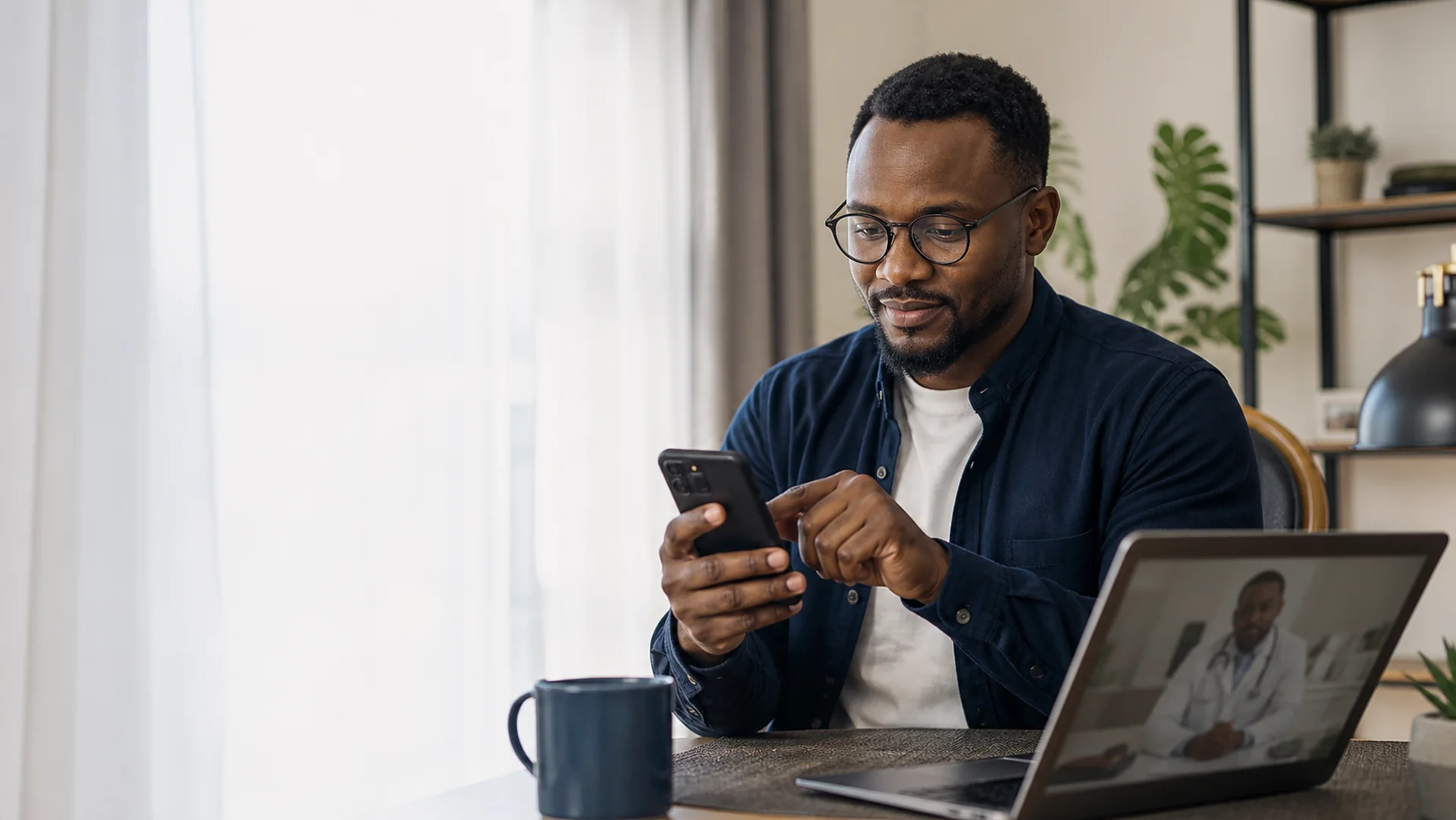 Nigerian patient booking an online doctor appointment from home